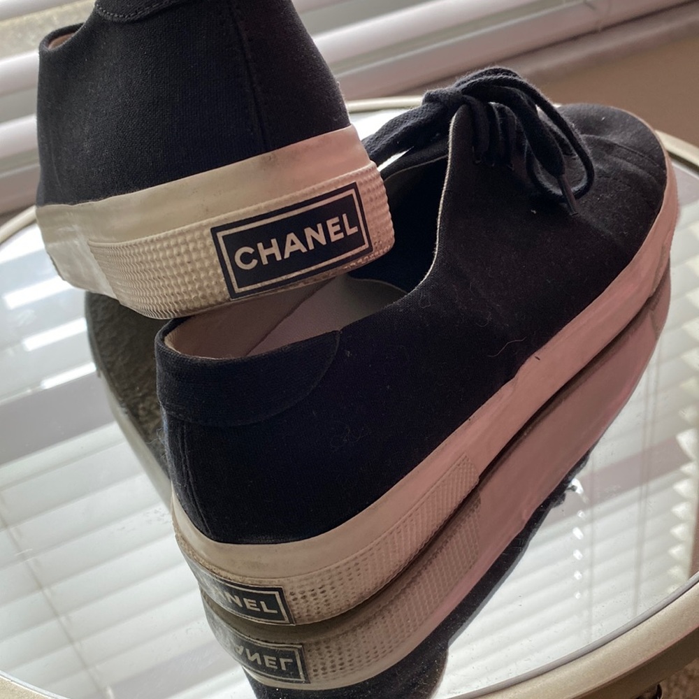 Authentic Chanel sneakers with double C  stitching on toe.